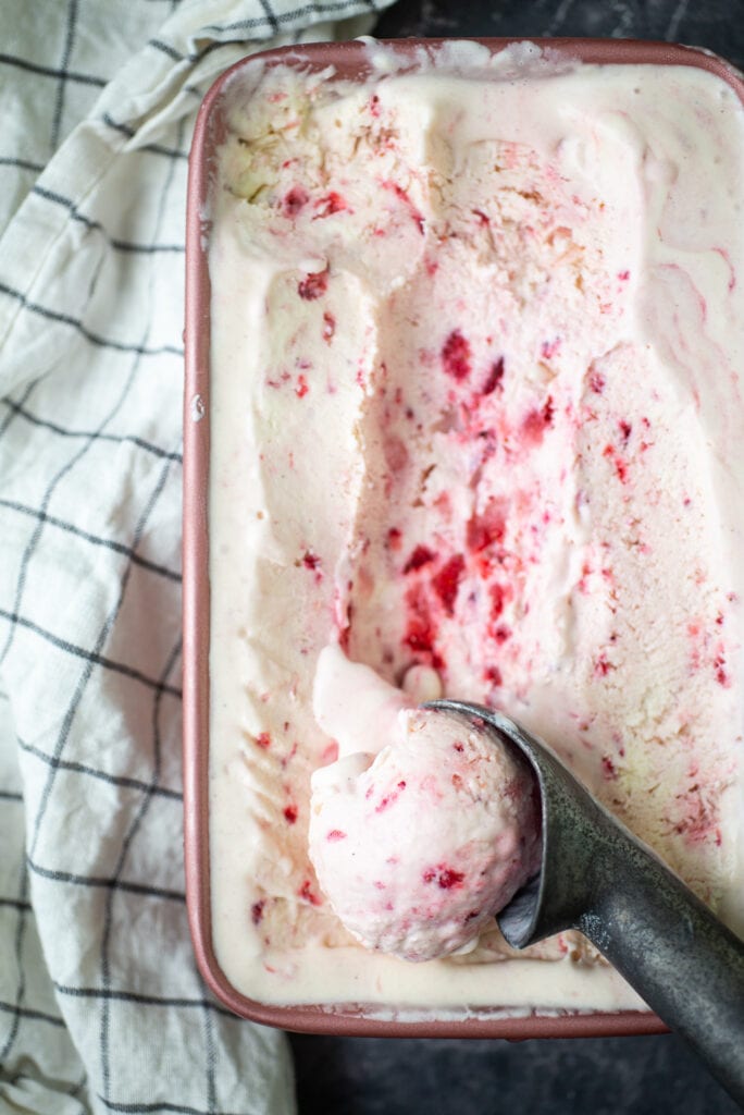 Scoop of ice cream in container